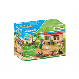 ENFANT AVEC ENCLOS ET LAPINS